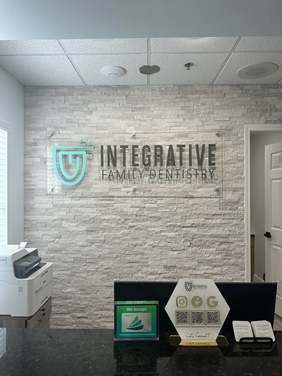 Reception area with stone logo wall