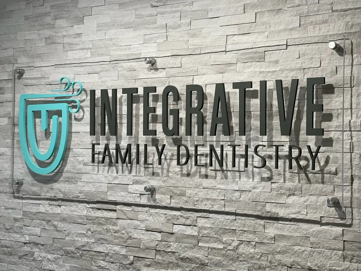 Integrative Family Dentistry logo wall in the Roswell office