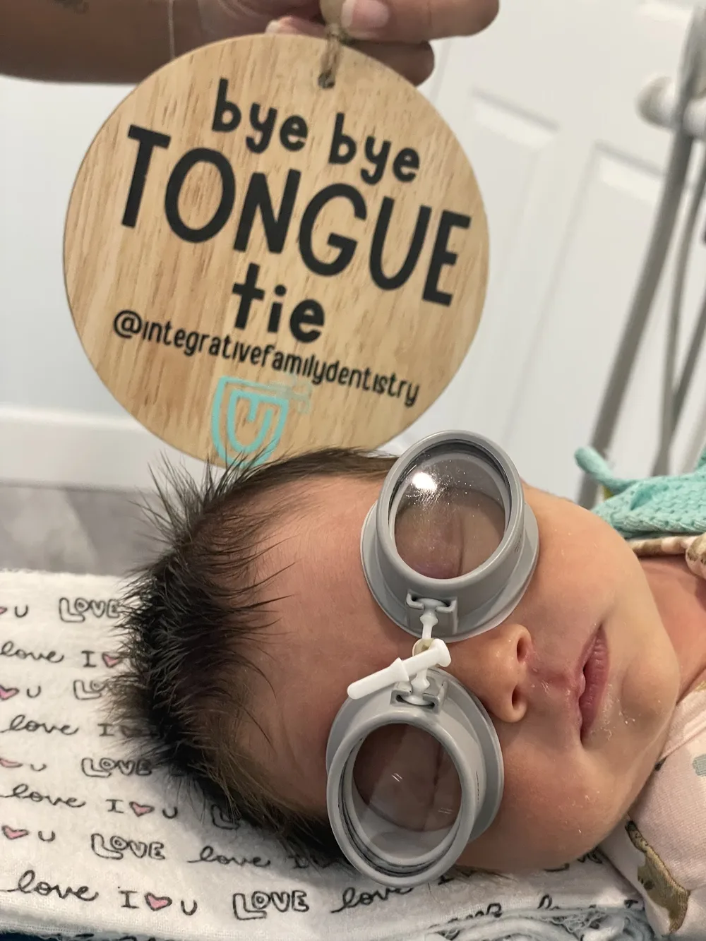 Infant after a gentle laser tongue tie release at Integrative Family Dentistry